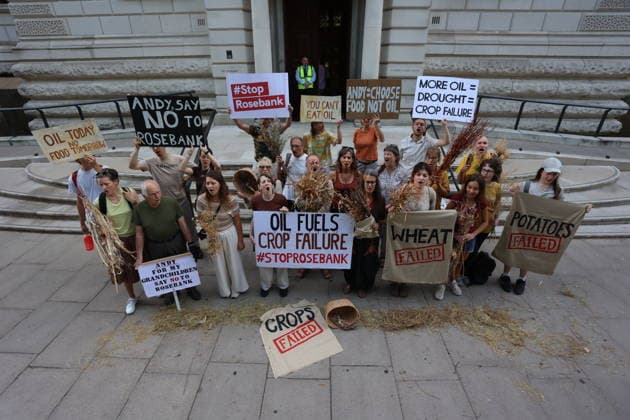 Fossil Free London Crop Failure Protest outside the Treasury, London, UK 17 August 2026 Campaigners stage a protest outside the Treasury on Horse Guards Road, London, UK, on 17 August 2026, calling on Prime Minister Andy Burnham to reject the Rosebank oil field as the public consultation closes. Holding empty harvesting baskets and hessian bags labelled Wheat - Failed , the protesters highlight the connection between fossil fuel extraction and the crop failures resulting from climate-driven heatwaves and droughts., Credit:PETE SPELLER Avalon UK, London  Copyright: xPETExSPELLERx xAvalonx 1124555503