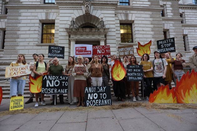 Fossil Free London Crop Failure Protest outside the Treasury, London, UK 17 August 2026 Campaigners stage a protest outside the Treasury on Horse Guards Road, London, UK, on 17 August 2026, calling on Prime Minister Andy Burnham to reject the Rosebank oil field as the public consultation closes. Holding empty harvesting baskets and hessian bags labelled Wheat - Failed , the protesters highlight the connection between fossil fuel extraction and the crop failures resulting from climate-driven heatwaves and droughts., Credit:PETE SPELLER Avalon UK, London  Copyright: xPETExSPELLERx xAvalonx 1124555562