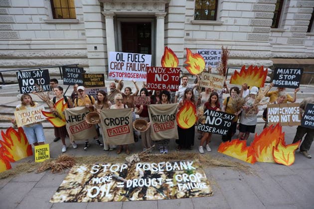 Fossil Free London Crop Failure Protest outside the Treasury, London, UK 17 August 2026 Campaigners stage a protest outside the Treasury on Horse Guards Road, London, UK, on 17 August 2026, calling on Prime Minister Andy Burnham to reject the Rosebank oil field as the public consultation closes. Holding empty harvesting baskets and hessian bags labelled Wheat - Failed , the protesters highlight the connection between fossil fuel extraction and the crop failures resulting from climate-driven heatwaves and droughts., Credit:PETE SPELLER Avalon UK, London  Copyright: xPETExSPELLERx xAvalonx 1124555590