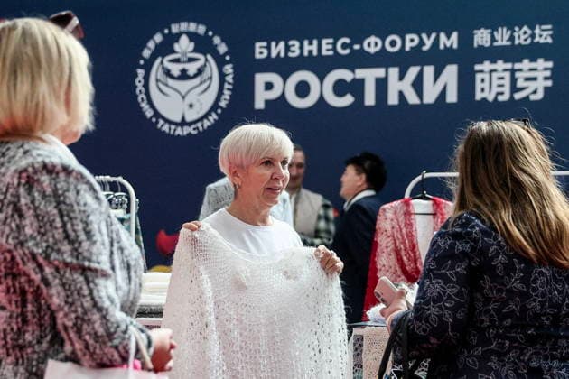 RUSSIA, REPUBLIC OF TATARSTAN - AUGUST 17, 2026: A woman takes part in the 2026 Russia-China Business Forum titled Sprouts: Russia and China Mutually Beneficial Cooperation and held at the Kazan Expo International Exhibition Centre in Bolshiye Kabany, southeast of Kazan. TASS Host Photo Agency Russia  - ZUMAt113 20260817_zaa_t113_132 Copyright: xSofyaxSandurskayax