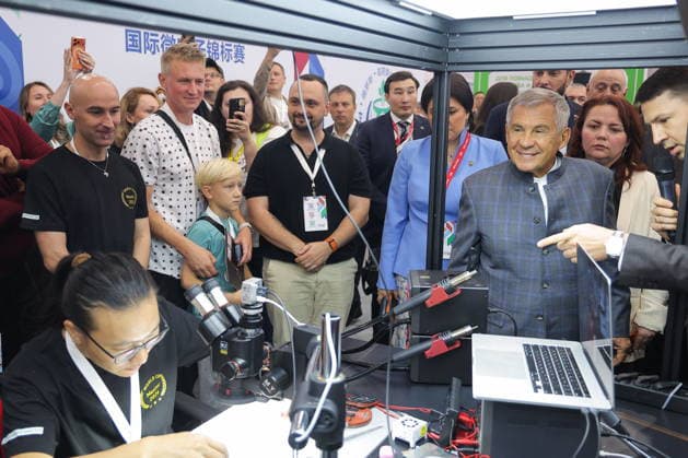 RUSSIA, REPUBLIC OF TATARSTAN - AUGUST 17, 2026: Rustam Minnikhanov (2nd R front), Head of the Republic of Tatarstan, Chairman of the Association of Innovative Regions of Russia, views Russia-China Expo during the 2026 Russia-China Business Forum titled Sprouts: Russia and China Mutually Beneficial Cooperation and held at the Kazan Expo International Exhibition Centre in Bolshiye Kabany, southeast of Kazan. TASS Host Photo Age Russia  - ZUMAt113 20260817_zaa_t113_137 Copyright: xYegorxAleyevx
