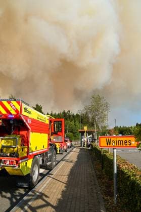 ATTENTION EDITORS - HANDOUT PICTURES - MANDATORY CREDIT - EDITORIAL USE ONLY - Handout pictured distributed shows Firemen in action as a fire rages in the Hautes Fagnes (High Fens) nature reserve, on Monday 17 August 2026. The fire started on August 14th and 2700 hectares (on a total of 4500) are impacted.  IMAGESxVHP 183602831