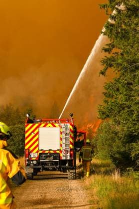 ATTENTION EDITORS - HANDOUT PICTURES - MANDATORY CREDIT - EDITORIAL USE ONLY - Handout pictured distributed shows Firemen in action as a fire rages in the Hautes Fagnes (High Fens) nature reserve, on Monday 17 August 2026. The fire started on August 14th and 2700 hectares (on a total of 4500) are impacted.  IMAGESxVHP 183602835