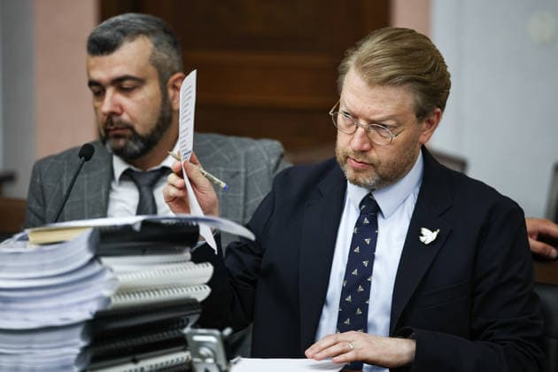RUSSIA, MOSCOW - AUGUST 17, 2026: Yabloko Party Chairman Nikolai Rybakov (R) and lawyer Gadzhi Aliyev attend a hearing at the Russian Supreme Court on the party’s appeal to reinstate its candidate list for the upcoming 2026 Russian State Duma election. Mikhail Tereshchenko TASS  96299162