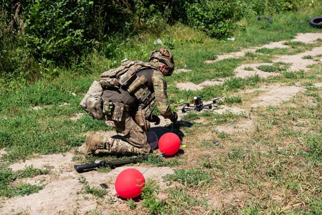 Khartiia brigade trains to counter FPV drones on Ukraine s frontline KHARKIV OBLAST, UKRAINE - AUGUST 17: Members of the air defense unit of the Khartiia Brigade demonstrate training against FPV drones in Kharkiv Oblast, Ukraine, on August 17, 2026. Soldiers attach balloons to FPV drones and practice shooting them down during the exercise. The training aims to improve the ability of air defense and infantry personnel to counter FPV drones in real combat situations along the front lines. Carlo Bravo Anadolu Kharkiv Ukraine. Editorial use only. Please get in touch for any other usage.  Copyright: x2026xAnadoluxCarloxBravox