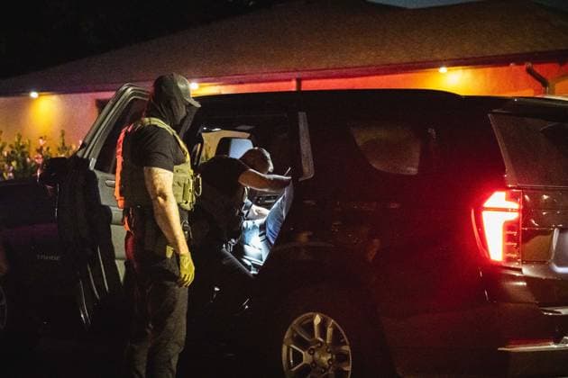 August 17, 2026, Fort Myers, Florida, USA: A coalition of law enforcement agencies which included IMMIGRATION AND CUSTOMS ENFORCEMENT (ICE) Enforcement and Removal Operations (ERO), Lee County SheriffÃ¢â‚¬â ¢s department and Fort Myers Police detain a man and place him in the custody of the federal government. Fort Myers USA - ZUMAd256 20260817_znp_d256_004 Copyright: xDavexDeckerx