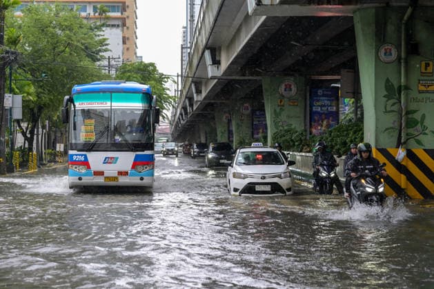 August 17, 2026, Philippines: Motorists and commuters brave the floods brought by torrential monsoon rains at Taft Ave., Manila, Metro Manila. Two days ago, Metro Manila and neighboring provinces experienced a hot and humid weather. Monsoon rain came back yesterday and persisted throughout the day with flash floods in different areas of the metropolitan. Philippines - ZUMAr240 20260817_zip_r240_049 Copyright: xMarcxDominicxRostratax