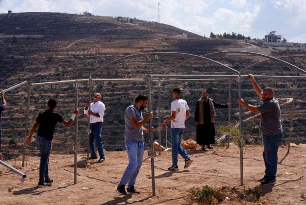 Three Palestinian families face restrictions in West Bank NABLUS, WEST BANK, PALESTINE - AUGUST 17: Israeli settlers have surrounded homes belonging to three Palestinian families for nine days in the Ras al-Ayn area of Qusra town, near Nablus, West Bank, Palestine on August 17, 2026. Access to food, water and basic necessities has been blocked for the homes, where approximately 13 Palestinians live. Issam H.s. Alasmar Anadolu Nablus West Bank. Editorial use only. Please get in touch for any other usage.  Copyright: x2026xAnadoluxIssamxH.s.xAlasmarx