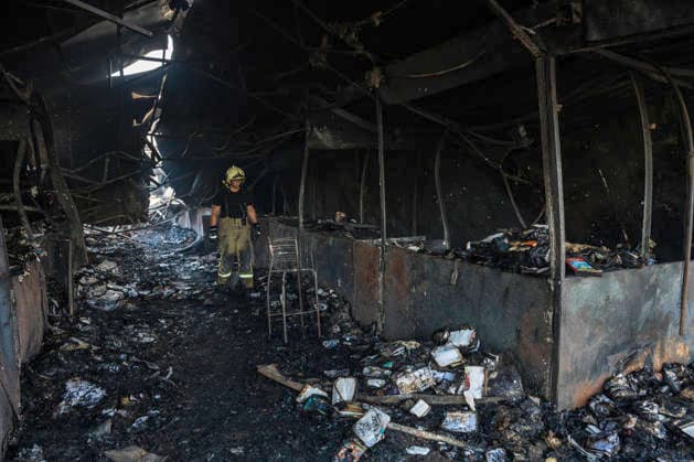 Aftermath Of A Russian Ballistic Missile Strike On Ukraine s Largest Book Market In Ukraine A firefighter works to extinguish remaining hotspots at Ukraine s largest book market in Kyiv, Ukraine, on August 17, 2026, following a fire caused by a Russian ballistic missile attack on the city overnight on August 16. Kyiv Ukraine  Copyright: xMaxymxMarusenkox originalFilename: musiienko-notitle260817_npHQs.jpg