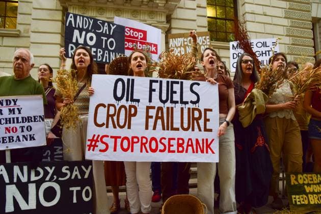 Anti-Rosebank Protests in London, UK - 17 Aug 2026 Climate activists from the group Fossil Free London hold placards opposed to fossil fuels and highlighting crop failures amidst the ongoing drought during a protest against Rosebank outside the Treasury. Two separate groups staged protests in Westminster as the public consultation on the North Sea oil and gas field concludes. London United Kingdom Copyright: xVukxValcicx xSOPAxImagesx Vuk-Valcic-1442834