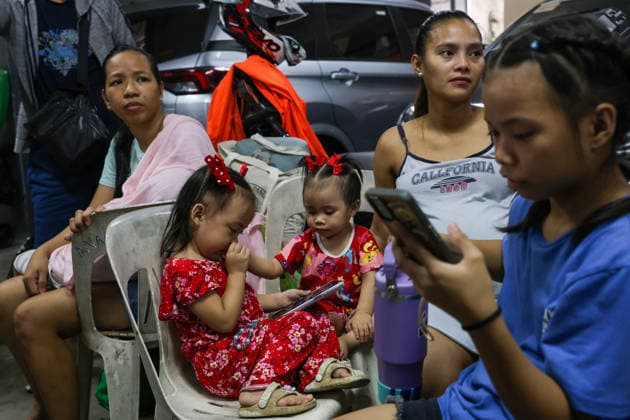 Tens of thousands evacuated in Philippines amid monsoon rains, floods QUEZON CITY, PHILIPPINES - AUGUST 18: People evacuated from flooded areas take shelter at a secondary school-turned emergency shelter, amid lingering threats of flooding caused by heavy monsoon rains, in Quezon City, Metro Manila, Philippines, on August 18, 2026. As the country remains threatened by floods caused by monsoon heavy rains, tens of thousands of people in the capital region of Metro Manila and its surrounding cities and areas have been evacuated, with schools in multiple locations across the Philippines being suspended for safety reasons. Daniel Ceng Anadolu Quezon City Philippines. Editorial use only. Please get in touch for any other usage.  Copyright: x2026xAnadoluxDanielxCengx