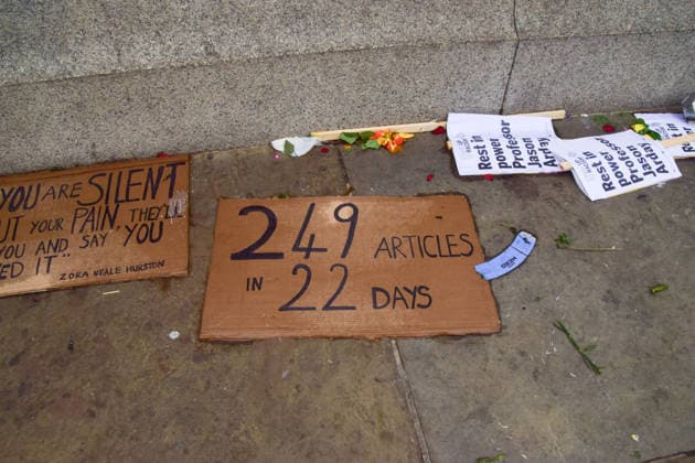 August 18, 2026, London, England, United Kingdom: A placard stating 249 articles in 22 days has been left among floral tributes for Jason Arday at the base of Nelson s Column in Trafalgar Square following a vigil which took place the night before. The former University of Cambridge sociology professor died several days after he resigned following accusations of academic plagiarism and scrutiny of his personal claims. London United Kingdom - ZUMAv130 20260818_zip_v130_003 Copyright: xVukxValcicx