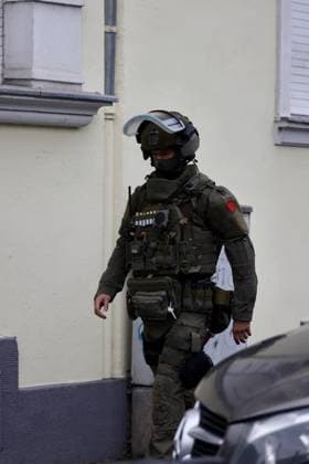 Police seal off Erlenhofstrasse in Cologne after reports of gunshots from attic COLOGNE, GERMANY - AUGUST 18: German police officers secure the cordoned-off perimeter around Erlenhofstrasse during an ongoing armed operation in the Niehl district of Cologne, Germany, on August 18, 2026. Following reports that a man fired gunshots into the air from an attic apartment, numerous police units were dispatched to the scene, shutting down Erlenhofstrasse and surrounding connecting roads to vehicular and pedestrian traffic while urging the public to avoid the area. Kadir Ilboga Anadolu Cologne Germany. Editorial use only. Please get in touch for any other usage.  Copyright: x2026xAnadoluxKadirxIlbogax