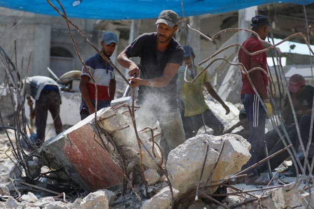 Gaza residents salvage metal from destroyed homesGaza residents salvage metal from destroyed homes KHAN YOUNIS, GAZA STRIP, PALESTINE, AUGUST 18, 2026: Palestinians salvage metal from the rubble of destroyed homes in Khan Younis for reuse in making tents and other items needed for daily life, amid shortages of materials and limited resources in the Gaza Strip. KHAN YOUNIS Palestine, State of Copyright: x xRamzixAbuxAmerx xJNAxPressx