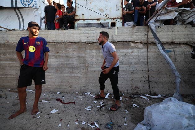 Palestinians Gather at Site of Israeli Strike in Gaza City Palestinians gather at the site of an Israeli airstrike that targeted a group of civilians on the seafront west of Gaza City, on August 18, 2026. Medical sources said six Palestinians, including a child, were killed and 14 others were wounded in the strike. Photo by Hadi Daoud apaimages Gaza city Gaza Strip Palestinian Territory 180826_Gaza_HD_00(8) Copyright: xapaimagesxHadixDaoudx xapaimagesx