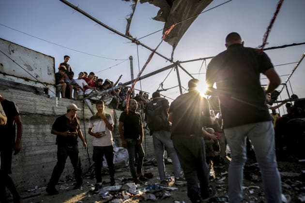 Israeli drone strike on crowded Gaza cafe kills 6 Palestinians GAZA CITY, GAZA, PALESTINE - AUGUST 18: Palestinians gather around destroyed beachfront cafe in Gaza City, Gaza, Palestine on August 18, 2026, following an Israeli airstrike that killed at least six people, including a child, and injured more than 12 others. The attack on the civilian gathering spot occurred despite recent calls from U.S. President Donald Trump urging Israel to halt its military operations across the Gaza Strip, as local rescue teams worked to retrieve victims from the damaged structure. Saeed M. M. T. Jaras Anadolu Gaza City Gaza. Editorial use only. Please get in touch for any other usage.  Copyright: x2026xAnadoluxSaeedxM.xM.xT.xJarasx