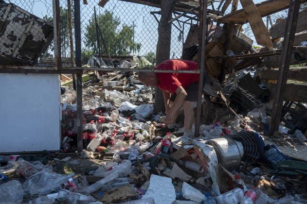 Aftermath of Russian attack in Kharkiv KHARKIV, UKRAINE - AUGUST 18: A view of destruction after the Russians fired two Banderole missiles at a cafe and a store in the center of the village of Pechenigi in the Kharkiv region in Russia, on August 18, 2026. Ten civilians were killed, and at least 18 were injured. Seven cars were burned, 15 were damaged, and 10 private homes, a post office, and five stores were damaged. Serhii Masin Anadolu Kharkiv Ukraine. Editorial use only. Please get in touch for any other usage.  Copyright: x2026xAnadoluxSerhiixMasinx