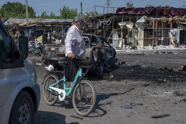 Aftermath of Russian attack in Kharkiv KHARKIV, UKRAINE - AUGUST 18: A view of destruction after the Russians fired two Banderole missiles at a cafe and a store in the center of the village of Pechenigi in the Kharkiv region in Russia, on August 18, 2026. Ten civilians were killed, and at least 18 were injured. Seven cars were burned, 15 were damaged, and 10 private homes, a post office, and five stores were damaged. Serhii Masin Anadolu Kharkiv Ukraine. Editorial use only. Please get in touch for any other usage.  Copyright: x2026xAnadoluxSerhiixMasinx