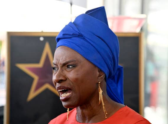 Five-time Grammy-winning Beninese musician, actress, and activist Angelique Kidjo speaks with reporters during an unveiling ceremony honoring her with the 2,854th star on the Hollywood Walk of Fame in Los Angeles on Tuesday, August 18, 2026.  LAP2026081818 JIMxRUYMEN