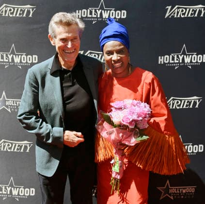 Five-time Grammy-winning Beninese musician, actress, and activist Angelique Kidjo is joined by actor Willem Dafoe (L) looks on during an unveiling ceremony honoring her with the 2,854th star on the Hollywood Walk of Fame in Los Angeles on Tuesday, August 18, 2026.  LAP2026081830 JIMxRUYMEN