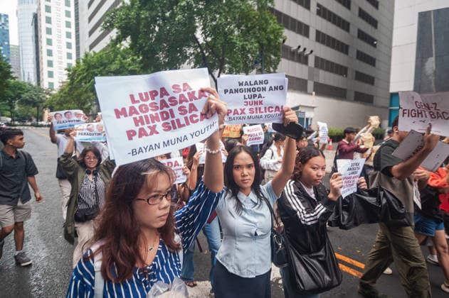 August 19, 2026, Quezon City, Quezon, Philippines: A protest made up of youth groups and progressive sectoral groups marched along the streets of Bonifacio Global City toward the headquarters of the BCDA to reject the proposed Pax Silica. Quezon City Philippines - ZUMAy102 20260819_zip_y102_007 Copyright: xKenosisxYapx