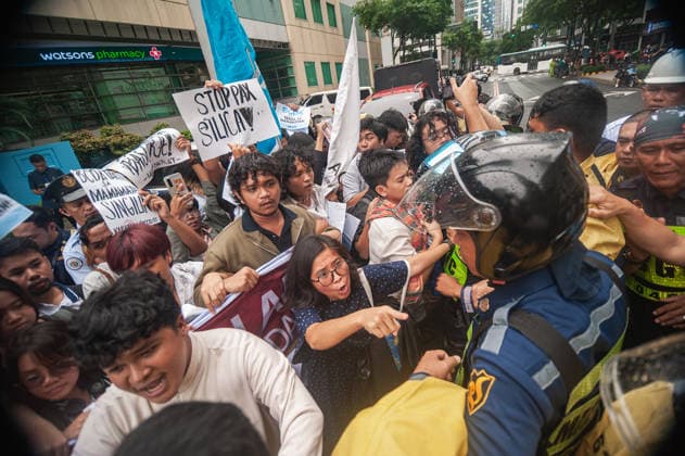 August 19, 2026, Quezon City, Quezon, Philippines: A protest made up of youth groups and progressive sectoral groups marched along the streets of Bonifacio Global City toward the headquarters of the BCDA to reject the proposed Pax Silica. Quezon City Philippines - ZUMAy102 20260819_zip_y102_012 Copyright: xKenosisxYapx