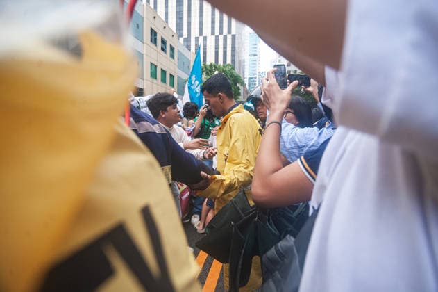 August 19, 2026, Quezon City, Quezon, Philippines: A protest made up of youth groups and progressive sectoral groups marched along the streets of Bonifacio Global City toward the headquarters of the BCDA to reject the proposed Pax Silica. Quezon City Philippines - ZUMAy102 20260819_zip_y102_015 Copyright: xKenosisxYapx