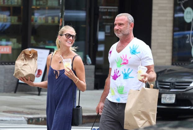 Liev Schreiber With His Wife Out in NYC Actor Liev Schreiber with a funny hand painted tshirt is walking with his wife Taylor Neisen in Soho, New York on August 18, 2026. Photo by Dylan Travis ABACAPRESS.COM New York City New York United States  Copyright: xDylanxTravis ABACAx