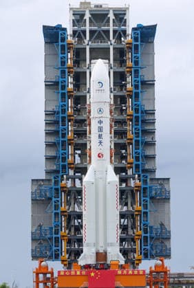 (260819) -- WENCHANG, Aug. 19, 2026 -- The combination of the Chang e-7 lunar probe and the Long March-5 Y14 carrier rocket is transferred vertically to the launching area at the Wenchang Spacecraft Launch Site in south China s Hainan Province, Aug. 19, 2026. The Chang e-7 lunar probe is scheduled for launch at an appropriate time, according to the China Manned Space Agency (CMSA). The combination of the Chang e-7 lunar probe and the Long March-5 Y14 carrier rocket was transferred vertically on Wednesday to the launching area at the Wenchang Spacecraft Launch Site in south China s Hainan Province, the CMSA said. The lunar probe and rocket had arrived at the launch site in April and July, respectively, and have since completed assembl 