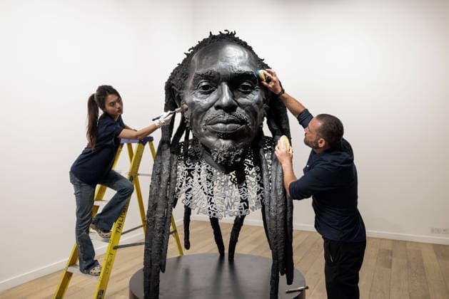 Benjamin Zephaniah sculpture Benjamin Zephaniah sculpture A sculpture of Benjamin Zephaniah by George Triggs is prepared for display at TM Gallery, London as part of a forthcoming exhibition opening 19 August to 30 September. Sculptor George Triggs who is dusting and polishing with bushes Along with Sculptor George Triggs who is dusting and polishing  Copyright: xVickixCouchmanx NINTCHDBPICT001101965417