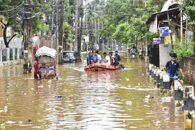 Heavy rainfall in India s Guwahati GUWAHATI, INDIA - AUGUST 19: People navigate through a waterlogged street on an inflatable boat following heavy rainfall in Guwahati, Assam state, India, on August 19, 2026. The severe monsoon downpour triggered widespread flash flooding and waterlogging across multiple neighborhoods, disrupting normal life and forcing residents to use makeshift watercraft and boats for daily transportation. Hafiz Ahmed Anadolu Guwahati India. Editorial use only. Please get in touch for any other usage.  Copyright: x2026xAnadoluxHafizxAhmedx