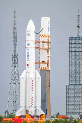 WENCHANG, CHINA - AUGUST 19: The combination of the Chang e-7 lunar probe and the Long March-5 Y14 carrier rocket is transferred vertically to the launching area at the Wenchang Spacecraft Launch Site on August 19, 2026 in Wenchang, Hainan Province of China. The Chang e-7 lunar probe is scheduled for launch at an appropriate time, according to the China Manned Space Agency (CMSA).  Copyright: xVCGx 111660854817