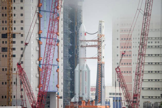 WENCHANG, CHINA - AUGUST 19: The combination of the Chang e-7 lunar probe and the Long March-5 Y14 carrier rocket is transferred vertically to the launching area at the Wenchang Spacecraft Launch Site on August 19, 2026 in Wenchang, Hainan Province of China. The Chang e-7 lunar probe is scheduled for launch at an appropriate time, according to the China Manned Space Agency (CMSA).  Copyright: xVCGx 111660854874