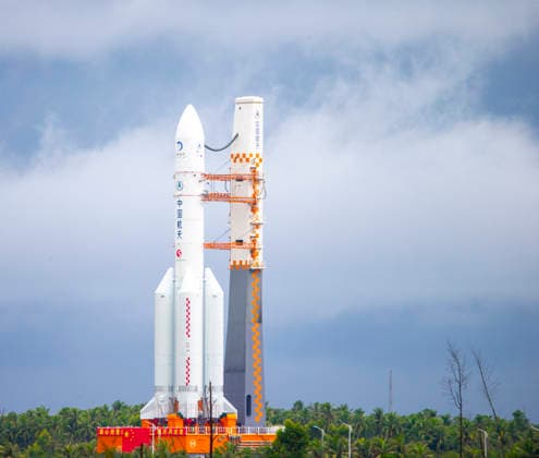 WENCHANG, CHINA - AUGUST 19: The combination of the Chang e-7 lunar probe and the Long March-5 Y14 carrier rocket is transferred vertically to the launching area at the Wenchang Spacecraft Launch Site on August 19, 2026 in Wenchang, Hainan Province of China. The Chang e-7 lunar probe is scheduled for launch at an appropriate time, according to the China Manned Space Agency (CMSA).  Copyright: xVCGx 111660854896
