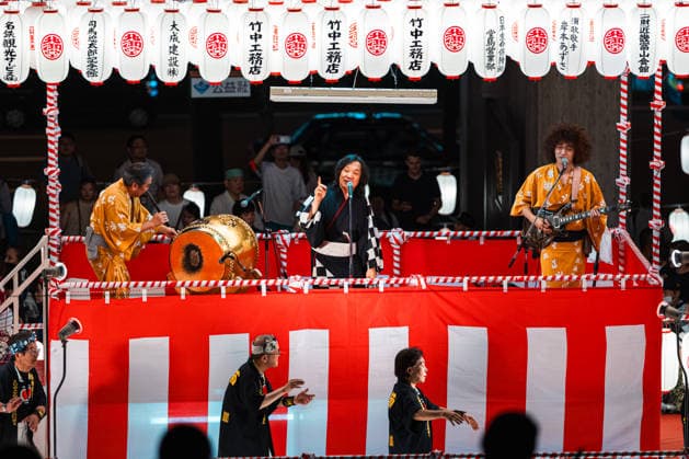 General view, August 19, 2026 - Participants dance around a yagura during the 54th Kitamido Bon Odori in Osaka, Japan. Held at Hongwanji Tsumura Betsuin (Kitamido), the annual summer festival brings together local residents and visitors for traditional Bon Odori, Kawachi Ondo performances, and evening festivities.  aflo_341483866