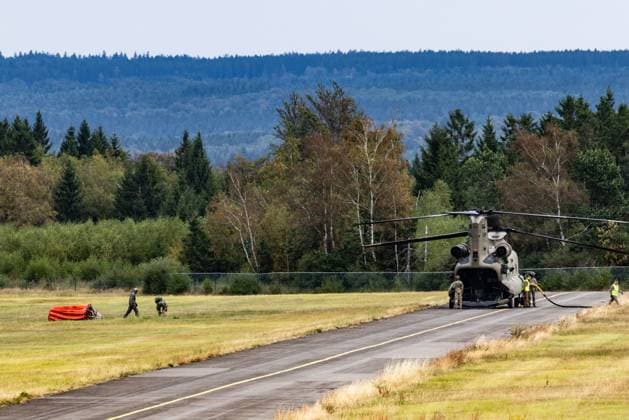 Chinook helicopter pictured on the Spa airfield near on the site of the fire in the Hautes Fagnes (High Fens) nature reserve, on Wednesday 19 August 2026. The fire started on August 14th and 3000 hectares (on a total of 4500) are impacted.  BRUNOxFAHY 183773803