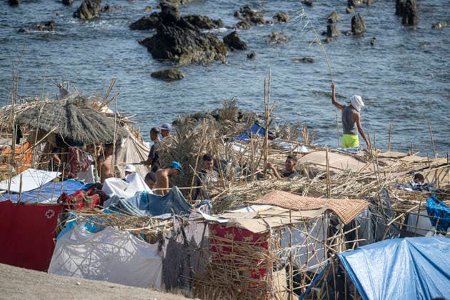 The humanitarian crisis in Ceuta continues. Migrants camped on Trampolín Beach, August 19, 2026, in Ceuta, Spain. Ceuta continues to face a serious humanitarian crisis following the historic mass influx of more than 70,000 migrants who swam across the Tarajal Strait on July 30 and 31. Although the current police deployment and border reinforcement by Moroccan authorities have succeeded in curbing the influx, the autonomous city continues to face a serious humanitarian, health, and security crisis. AUGUST 19, 2026, Spain  Copyright: xMarcosxMorenox 7720967
