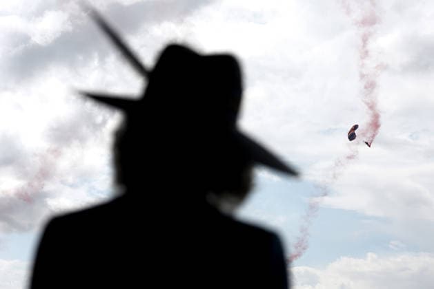 . 19 08 2026. York, United Kingdom. Queen Camilla watches the Falcons Parachute Display team during a visit to the Ebor Festival at York Racecourse, United Kingdom.  xPoolx xi-Imagesx IIM-26955-0030