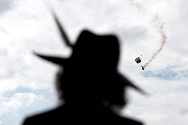 . 19 08 2026. York, United Kingdom. Queen Camilla watches the Falcons Parachute Display team during a visit to the Ebor Festival at York Racecourse, United Kingdom.  xPoolx xi-Imagesx IIM-26955-0031