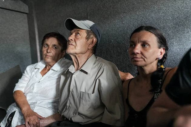 August 19, 2026, Serhiivka, Donetsk Oblast, Ukraine: A family in a van being evacuated from the village of Serhiivka, east of Kramatorsk, in the Donbas region, Ukraine, on August 19, 2026, by the White Angels crew. The White Angels crew, composed of police officers, evacuate people from the frontline towns and villages. Serhiivka Ukraine - ZUMAa252 20260819_zip_a252_012 Copyright: xDavidxAllignonx