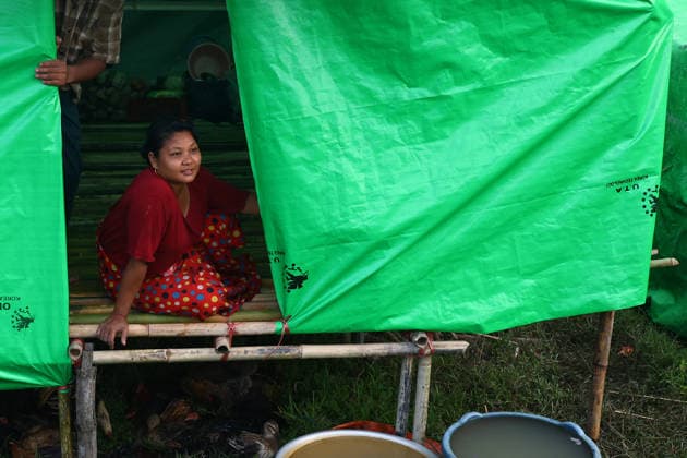 August 19, 2026, Ngathaingchaung, Ayeyarwady Division, Myanmar: Displaced residents in Ngathaingchaung Township, Ayeyarwady Region, build temporary shelters on a levee after homes were submerged by flooding..In Laymyethna Township, Ayeyarwady Region, the Ngawun River embankment collapsed on July 31, leaving nearby towns including Hinthada, Yegyi, Ngathaingchaung, Kyonpyaw and Kyaunggon still inundated, affecting tens of thousands of people, officials said. Ngathaingchaung Myanmar  - ZUMAn324 20260819_zip_n324_005 Copyright: xAyexMyaxNaingx