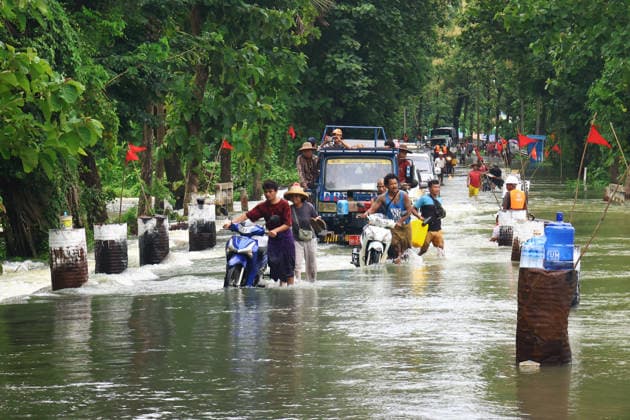 August 19, 2026, Ngathaingchaung, Ayeyarwady Division, Myanmar: Homes are submerged by floodwaters in Ngathaingchaung Township, Ayeyarwady Region..In Laymyethna Township, Ayeyarwady Region, the Ngawun River embankment collapsed on July 31, leaving nearby towns including Hinthada, Yegyi, Ngathaingchaung, Kyonpyaw and Kyaunggon still inundated, affecting tens of thousands of people, officials said. Ngathaingchaung Myanmar - ZUMAn324 20260819_zip_n324_030 Copyright: xAyexMyaxNaingx