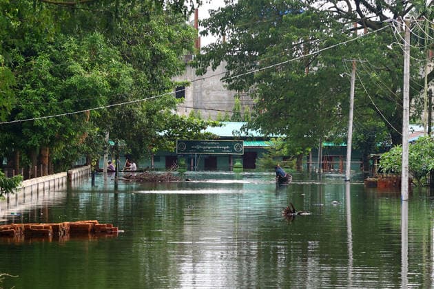 August 19, 2026, Ngathaingchaung, Ayeyarwady Division, Myanmar: Homes are submerged by floodwaters in Ngathaingchaung Township, Ayeyarwady Region..In Laymyethna Township, Ayeyarwady Region, the Ngawun River embankment collapsed on July 31, leaving nearby towns including Hinthada, Yegyi, Ngathaingchaung, Kyonpyaw and Kyaunggon still inundated, affecting tens of thousands of people, officials said. Ngathaingchaung Myanmar - ZUMAn324 20260819_zip_n324_039 Copyright: xAyexMyaxNaingx