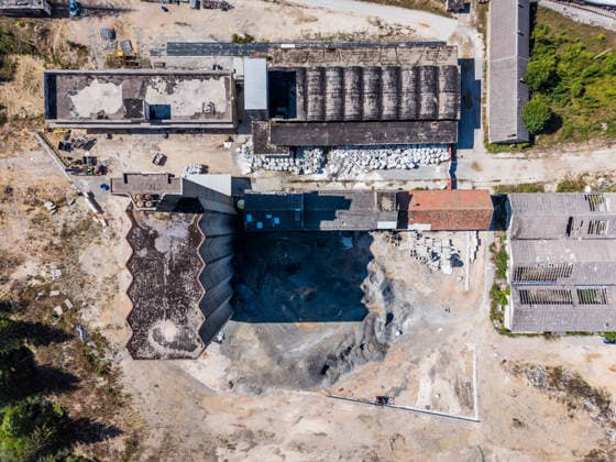 Aerial photo of Illegal hazardous waste disposal site in Gospic, Croatia Aerial photo of the illegal hazardous waste disposal site in Gospic, Croatia, on August 19, 2026. Approximately 37,000 tons of industrial and hazardous waste were illegally dumped at at an abandoned industrial complex in Gospic. Investigation details from Croatia s anti-corruption office, USKOK, outline massive environmental contamination and a network of institutional corruption.  ZvonimirxBarisin PIXSELL