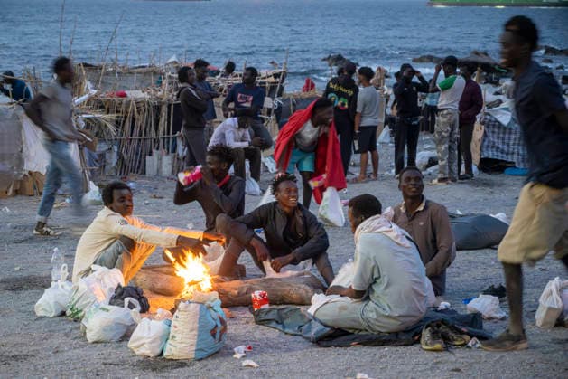 The humanitarian crisis in Ceuta continues. Several migrants on a beach, August 19, 2026, in Ceuta, Spain. Ceuta continues to face a serious humanitarian crisis following the historic mass influx of more than 70,000 migrants who swam across the Tarajal Strait on July 30 and 31. Although the current police deployment and border reinforcement by by Moroccan authorities have managed to stem the influx, the autonomous city continues to face a serious humanitarian crisis, health, and security crises. AUGUST 19, 2026 CEUTA MIGRATION CRISIS MIGRANTS IMMIGRANTS TRAMPOLÍN TARAJAL PLAYA BENÍTEZ Ceuta, Spain  Copyright: xMarcosxMorenox 7721821