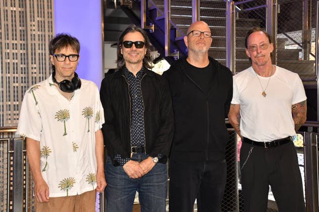 NEW YORK, NY - AUGUST 19: Weezer light the Empire State Building to Celebrate the Release of Weezer (The Gold Album) in Support of Hearts of Gold on August 19, 2026 in New York City. Copyright: xmpi099 MediaPunchx