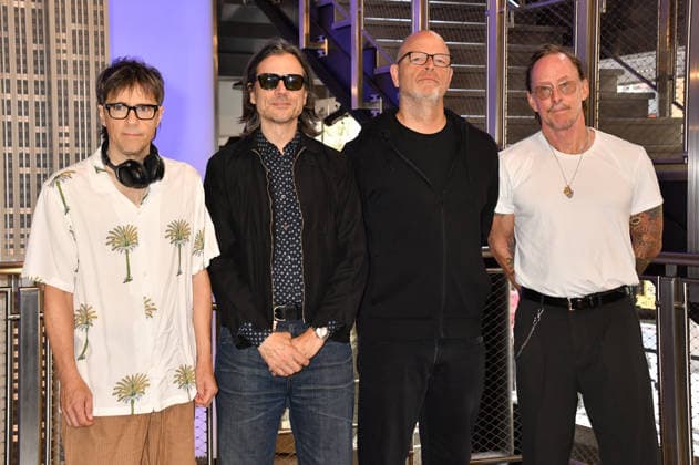 NEW YORK, NY - AUGUST 19: Weezer light the Empire State Building to Celebrate the Release of Weezer (The Gold Album) in Support of Hearts of Gold on August 19, 2026 in New York City. Copyright: xmpi099 MediaPunchx