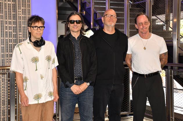 NEW YORK, NY - AUGUST 19: Weezer light the Empire State Building to Celebrate the Release of Weezer (The Gold Album) in Support of Hearts of Gold on August 19, 2026 in New York City. Copyright: xmpi099 MediaPunchx