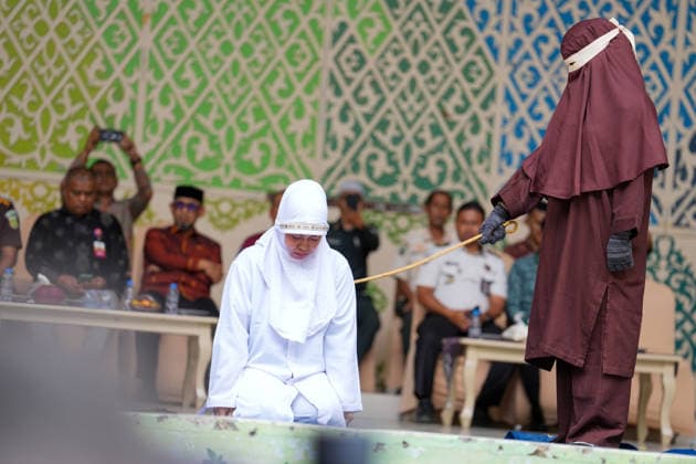 August 20, 2026, Banda Aceh, Aceh, Indonesia: A convict found guilty of violating Sharia law underwent a public caning at Bustanul Salatin Park in Banda Aceh, Aceh Province, Indonesia, on Thursday. A total of 11 individuals were publicly caned for various offensesÃ¢â‚¬ranging from gambling and being alone with a non-marital partner to adulteryÃ¢â‚¬receiving punishments that varied from 7, 10, and 22 to as many as 100 lashes. Banda Aceh Indonesia - ZUMAi115 20260820_zip_i115_012 Copyright: xMuhammadxIqbalx