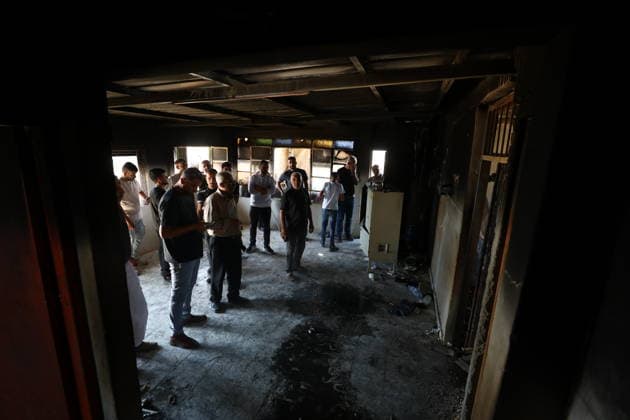 Israeli settlers set fire to a house in the West Bank HEBRON, WEST BANK, PALESTINE - AUGUST 20: Palestinians inspect the damage to a house that Israeli settlers set fire to, where a Palestinian mother and daughter lived, in the Hallet al-Fara area of Yatta, in the southern West Bank city of Hebron, Palestine, on August 20, 2026. Wisam Hashlamoun Anadolu Hebron West Bank. Editorial use only. Please get in touch for any other usage.  Copyright: x2026xAnadoluxWisamxHashlamounx